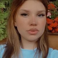 Мила