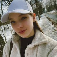 Мила
