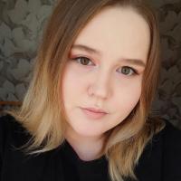 Таня