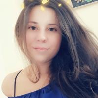 Оля Кос