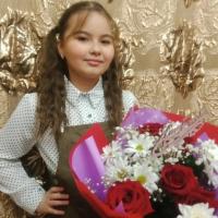 Карина Жампеисова